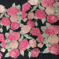 Jacquardstof in rood-rose-zwart gebloemde jersey